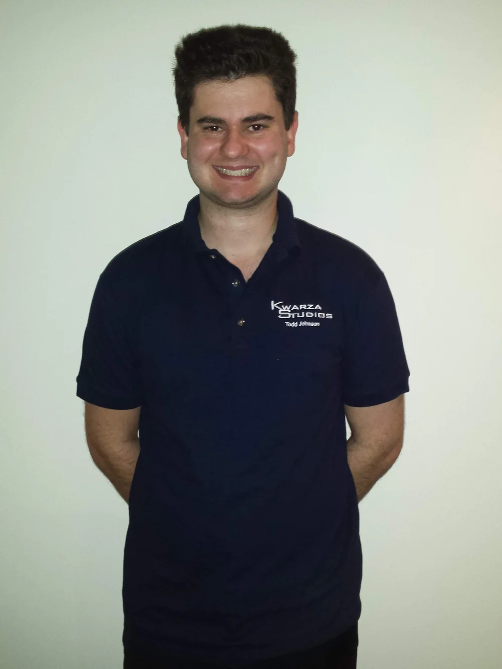 Todd wearing the branded polo shirt from his first web design business